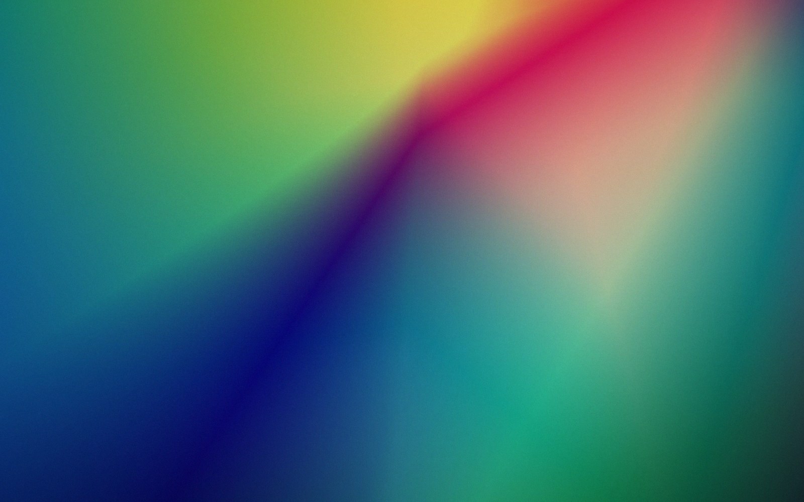 Diagonal gradient blending blue, green, yellow, and red tones across the frame